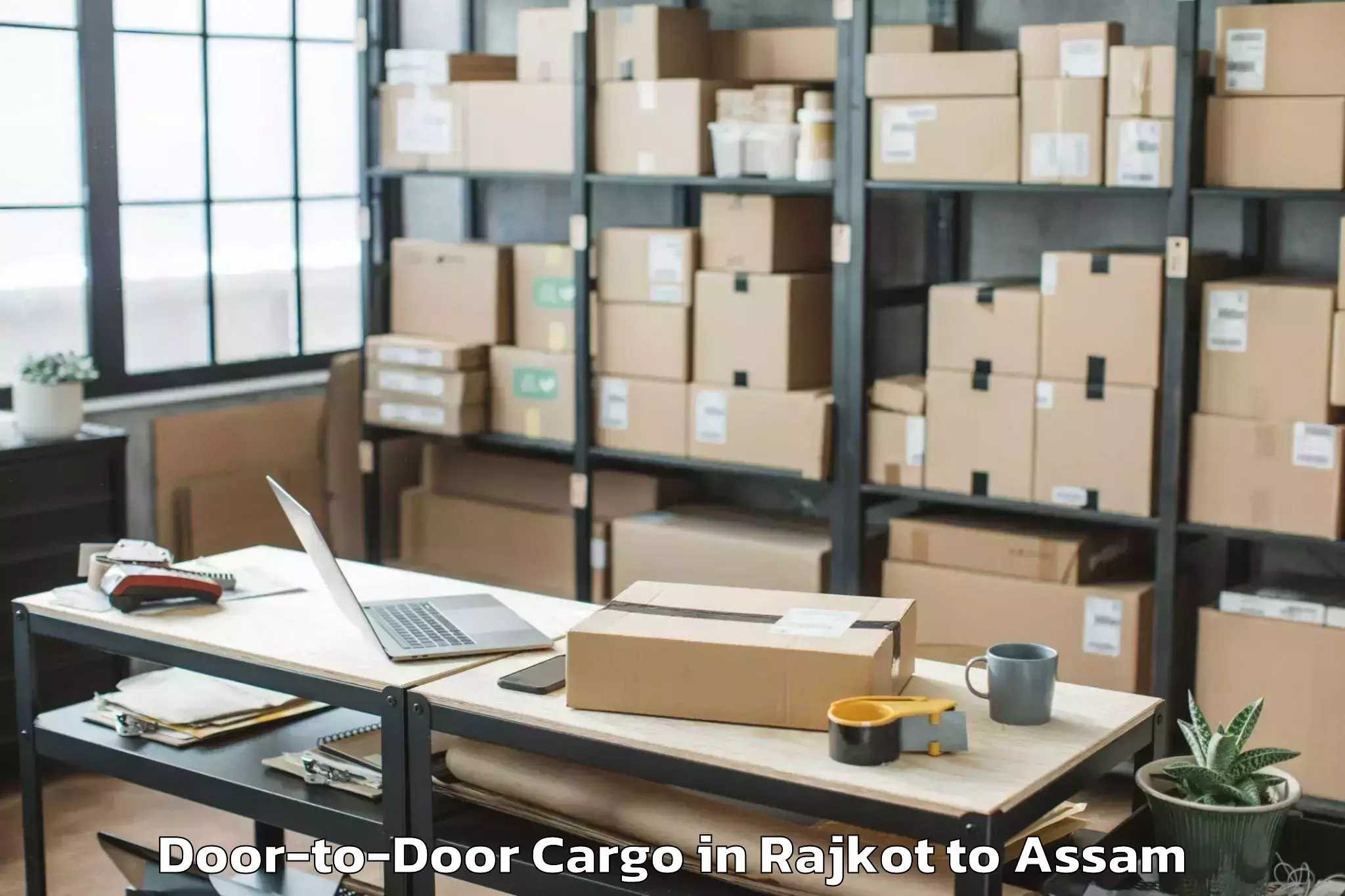 Reliable Rajkot to Gossaigaon Pt Door To Door Cargo